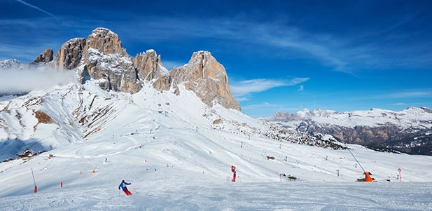Skiers enjoying the Italian alps while on holiday